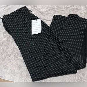 HAVE size medium NWT black with white stripes